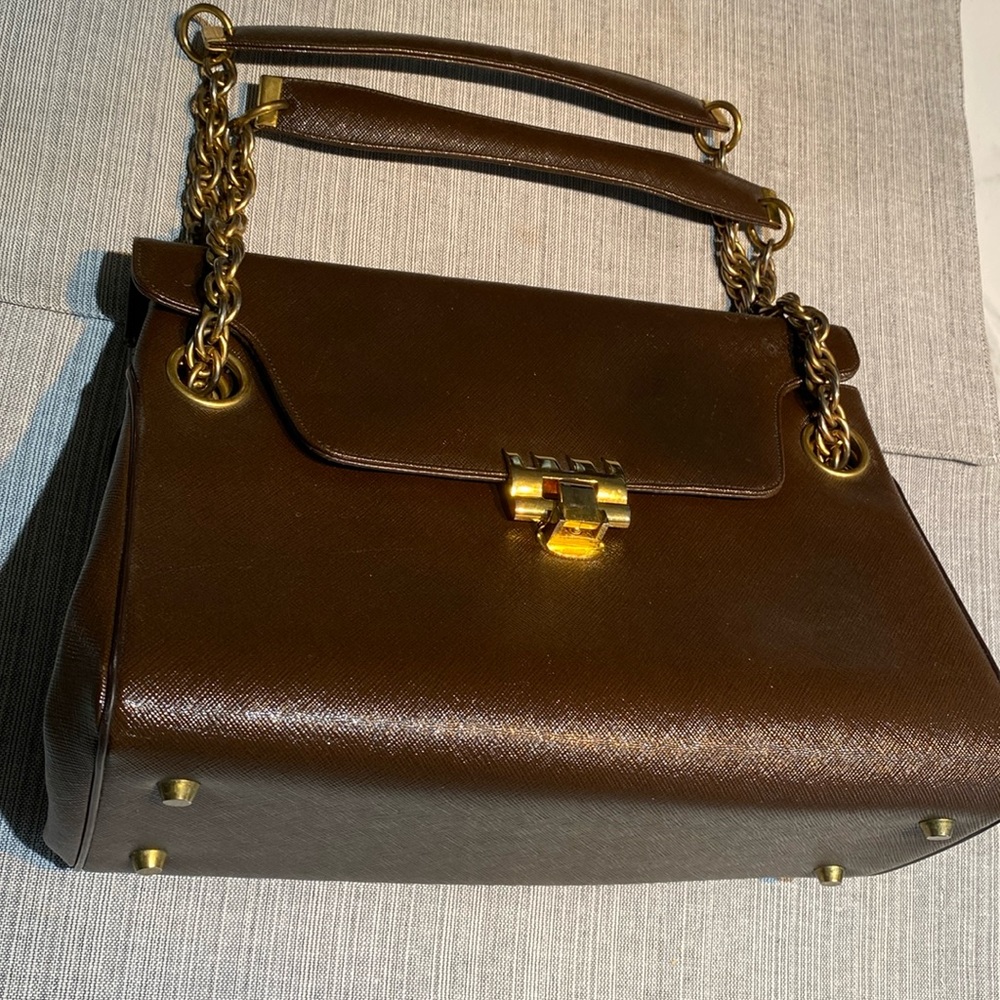 Never used brown leather purse. Comes with a change purse